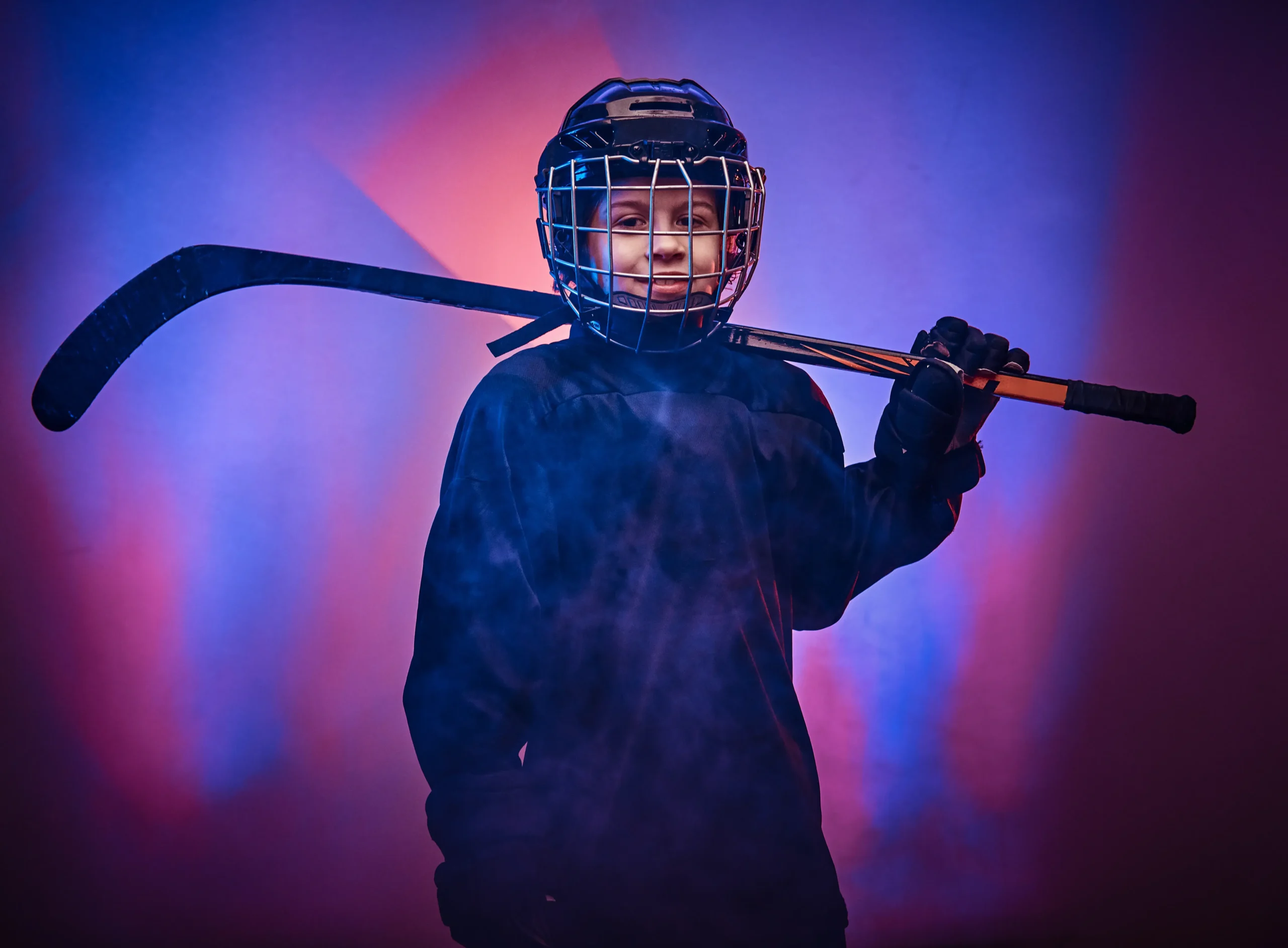 SPORTS young hockey player posing in uniform for a photos 2023 11 27 05 19 22 utc scaled